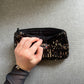 Pochette en sequins noir